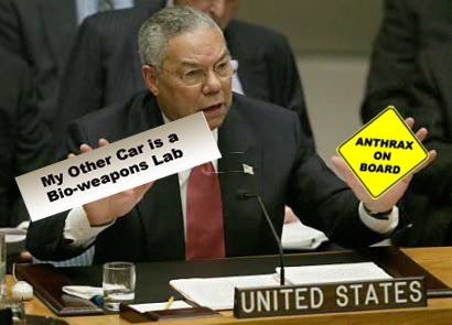 Powell holding "My Other Car is a Bio-weapons Lab" bumpesticker